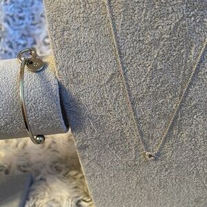 Silver ‘C’ necklace and Silver ‘C’ knotted cuff bracelet.